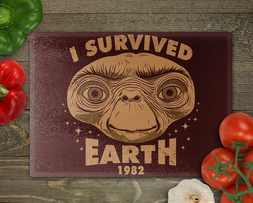 I Survived Earth Cutting Board