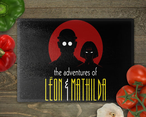 The Adventures of Leon & Mathilda Cutting Board